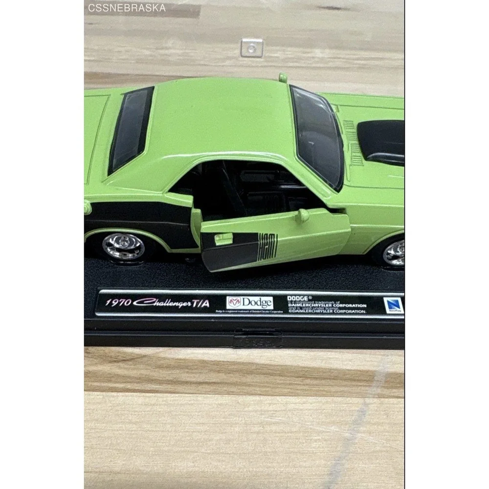 lime green. Die-Cast Model of a 1970‎ Dodge Challenger